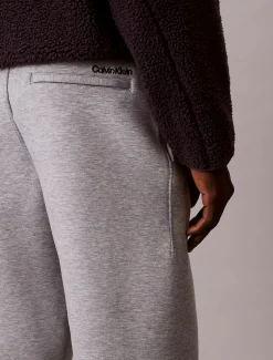 Calvin Klein Jeans miesten collegehousut Cotton Spacer Jogger, vaaleanharmaa