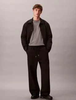 Calvin Klein Jeans miesten joggerit, LS PREMIUM TERRY CK EMBLEM JOGGER Musta
