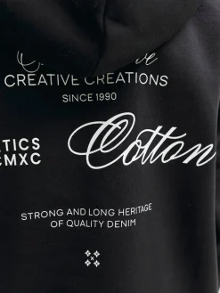 Jack and Jones Junior lasten huppari JJROAR SWEAT HOOD JNR, musta