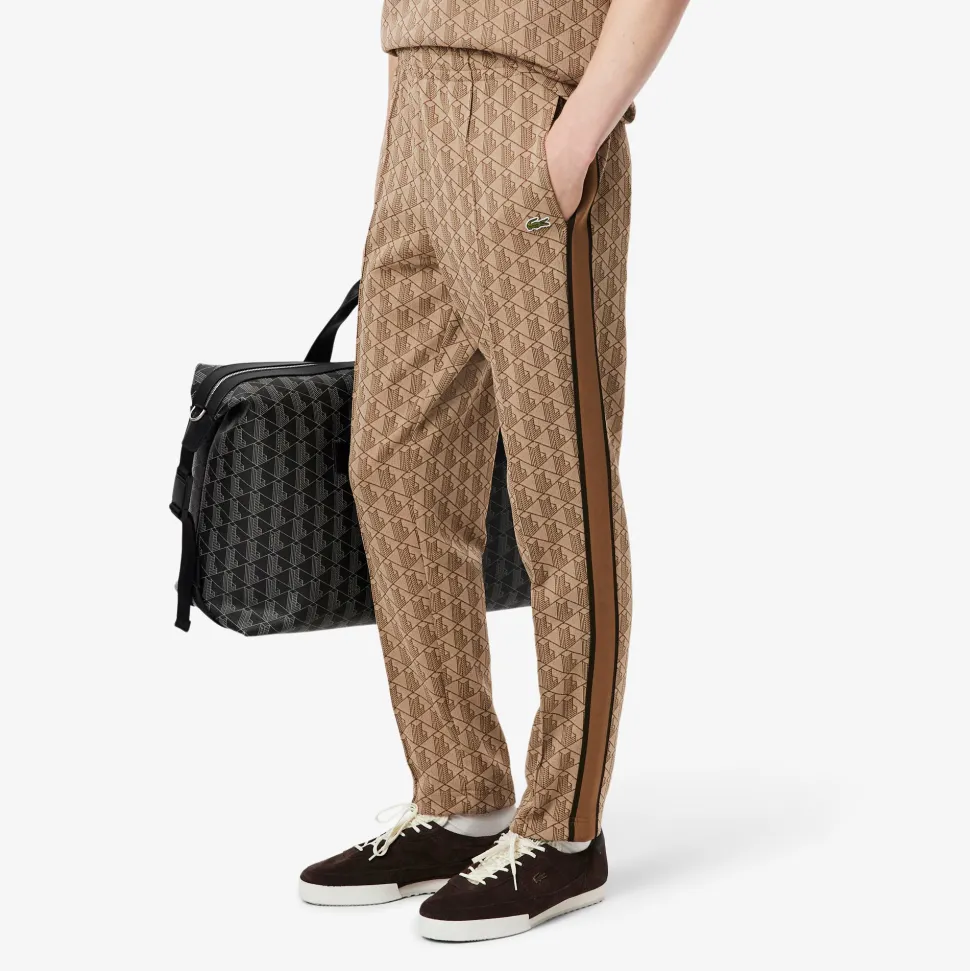 Lacoste miesten verryttelyhousut Parit Monogram Track Pant, beige