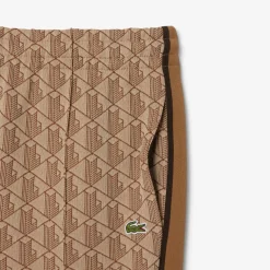 Lacoste miesten verryttelyhousut Parit Monogram Track Pant, beige