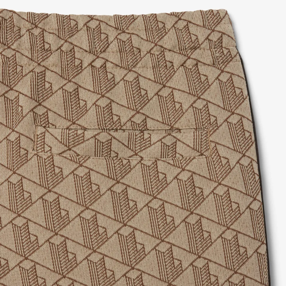 Lacoste miesten verryttelyhousut Parit Monogram Track Pant, beige