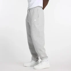 New Balance miesten collegehousut Sport Essentials Fleece Jogger Pants, vaaleanharmaa