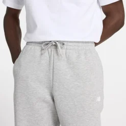 New Balance miesten collegehousut Sport Essentials Fleece Jogger Pants, vaaleanharmaa