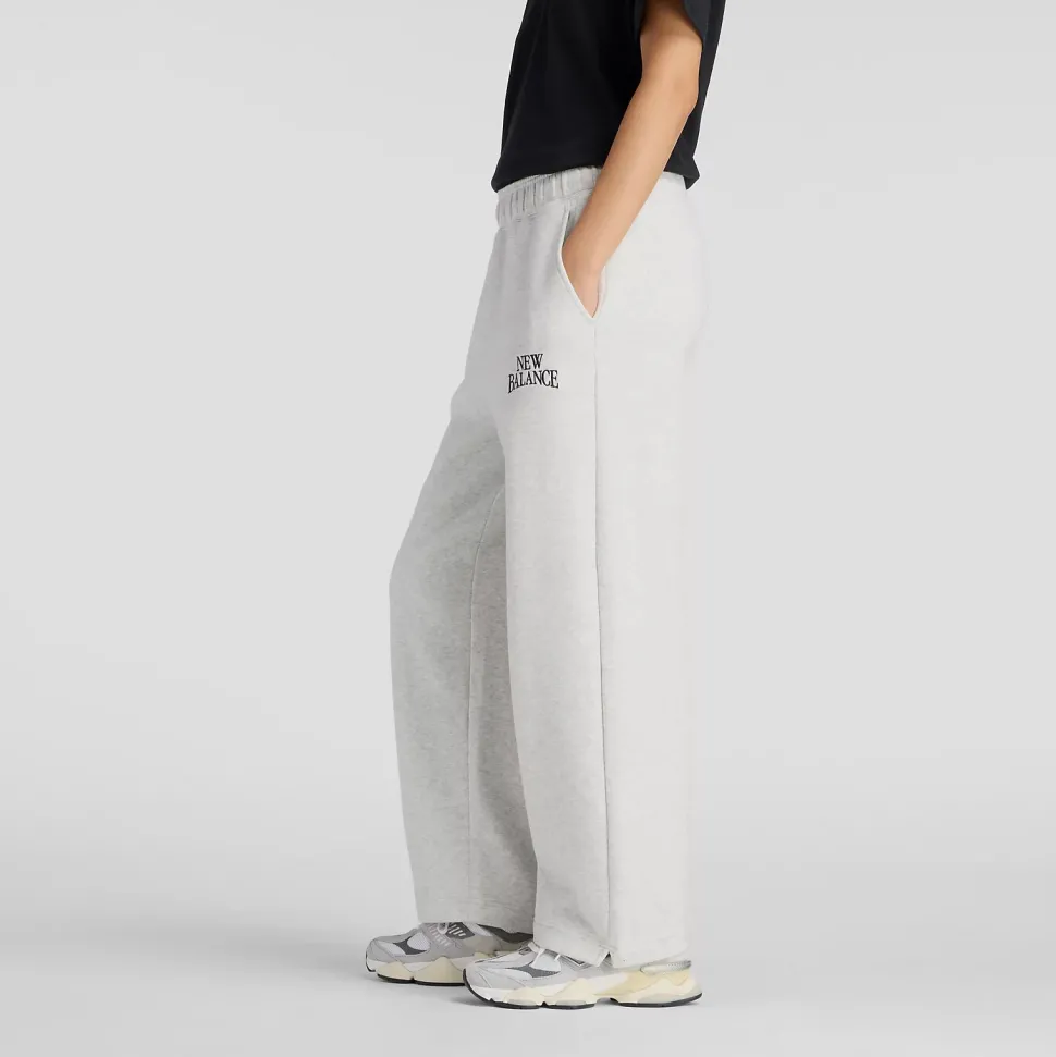New Balance naisten collegehousut Linear Heritage Fleece Barrel Pant, vaaleanharmaa